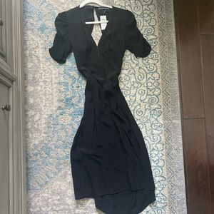 Black knee length dress. Cutout back. Size small